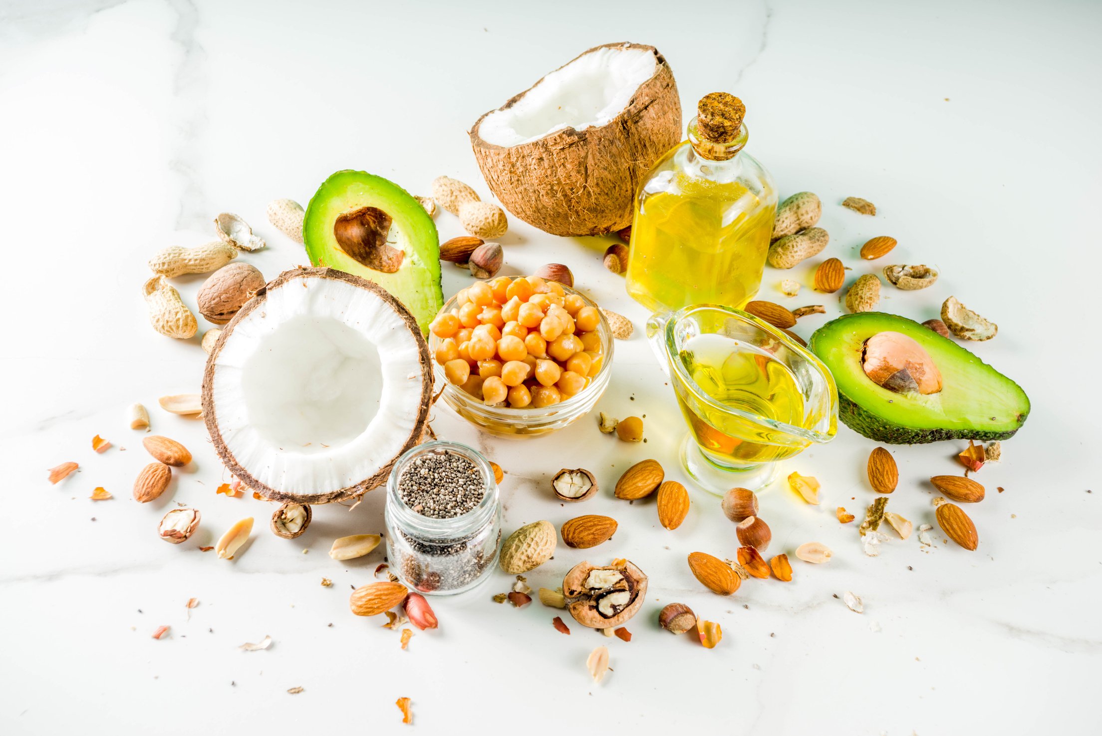 Healthy Vegan Fat Food Sources on White Background
